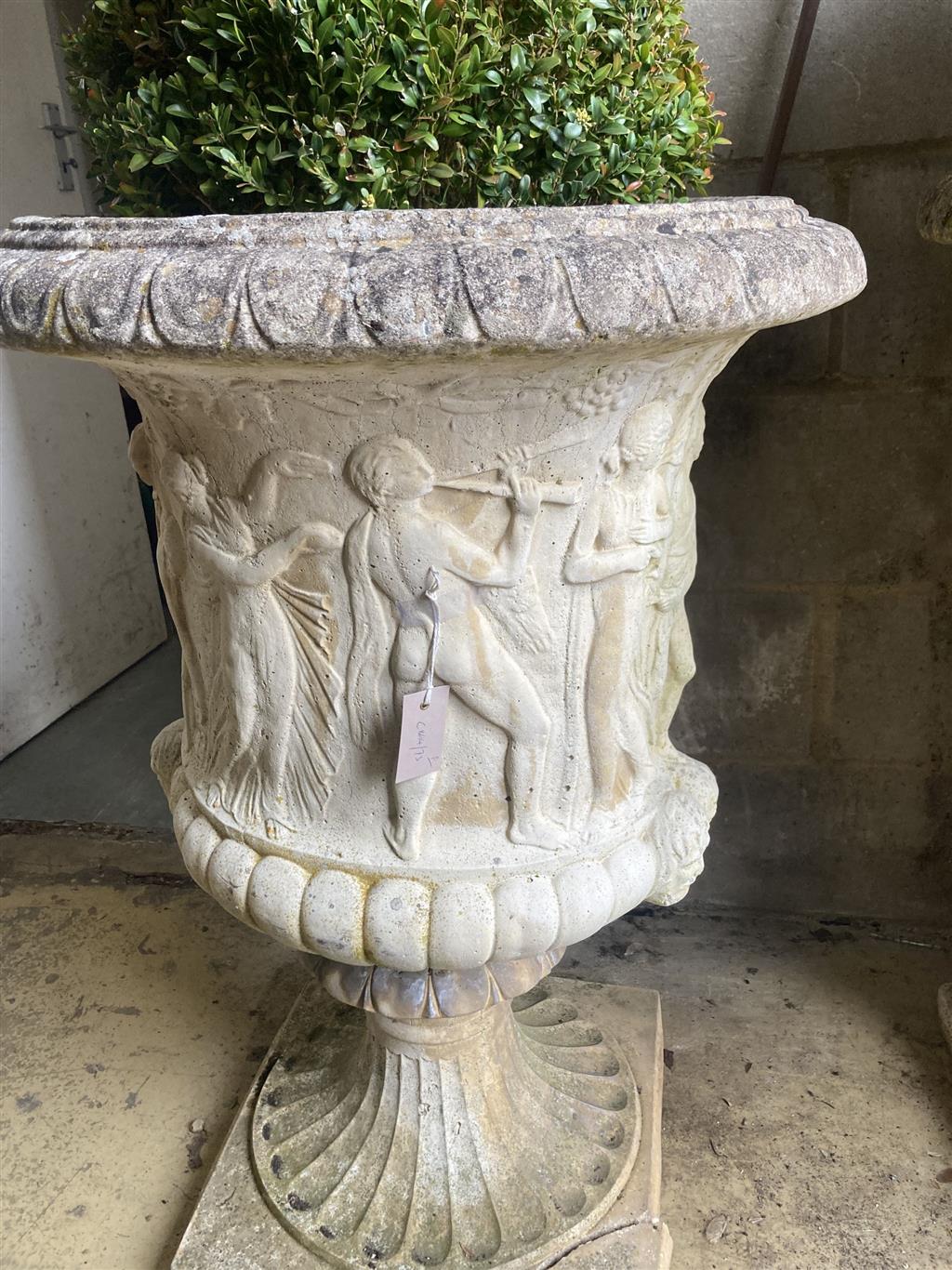 A pair of reconstituted stone campana shaped garden urns, diameter 60cm, height 90cm